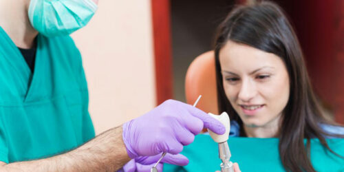 Check the cost of dental implants before getting treated