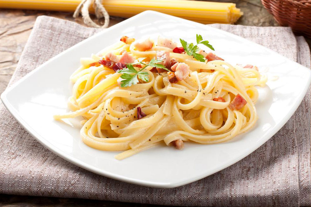 History of the classic spaghetti alla carbonara recipe