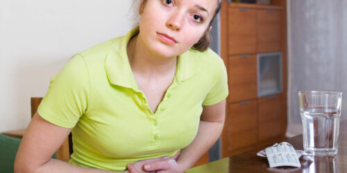 What are the symptoms of chronic constipation?