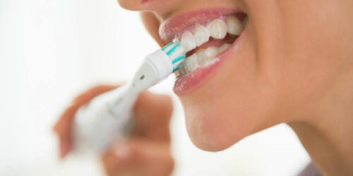 Teeth cleaning guide with Oral B electric toothbrush