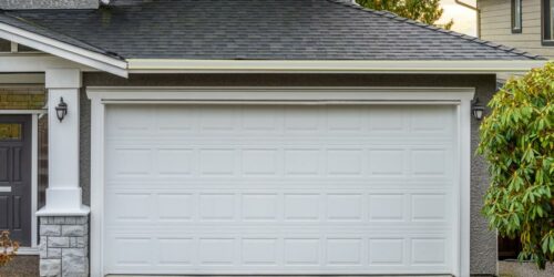 Vinyl and wooden garage door choices for modern houses